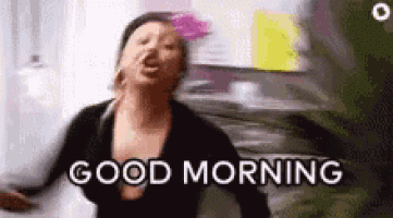 a woman is screaming and says `` good morning '' .