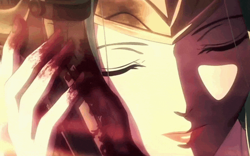 a close up of a woman 's face with blood coming out of her eyes