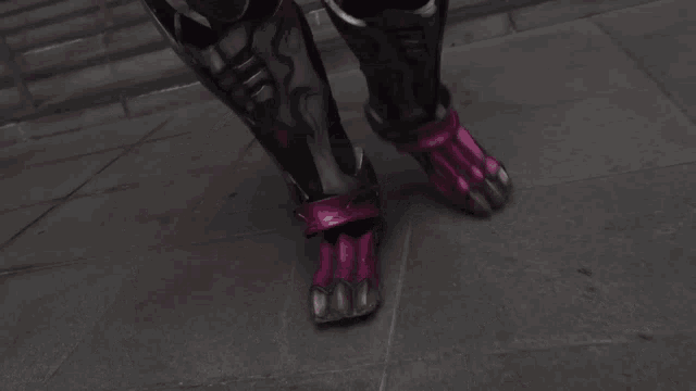 a close up of a person wearing a pink and black costume .