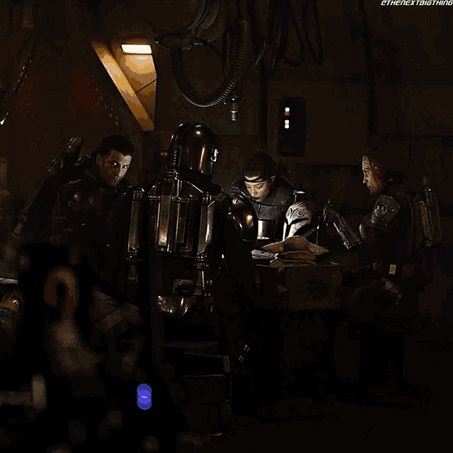 a group of soldiers are standing in a dark room and the next thing is written on the bottom right