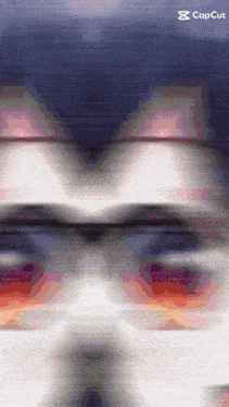 a blurred image of a person 's face with the capcut logo in the corner