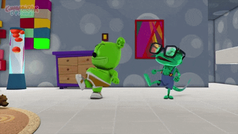 a gummy bear and a lizard are dancing in a room with the words gummy bear friends written on the wall behind them