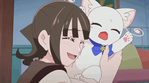 a girl is holding a white cat with a blue bow tie
