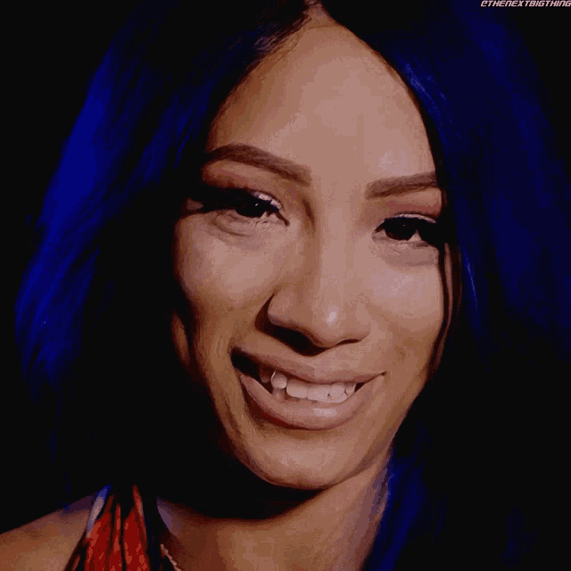 a close up of a woman 's face with the words " the next thing " on the bottom right