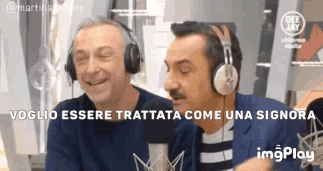 two men wearing headphones are laughing in front of a microphone with a gif that says imgplay
