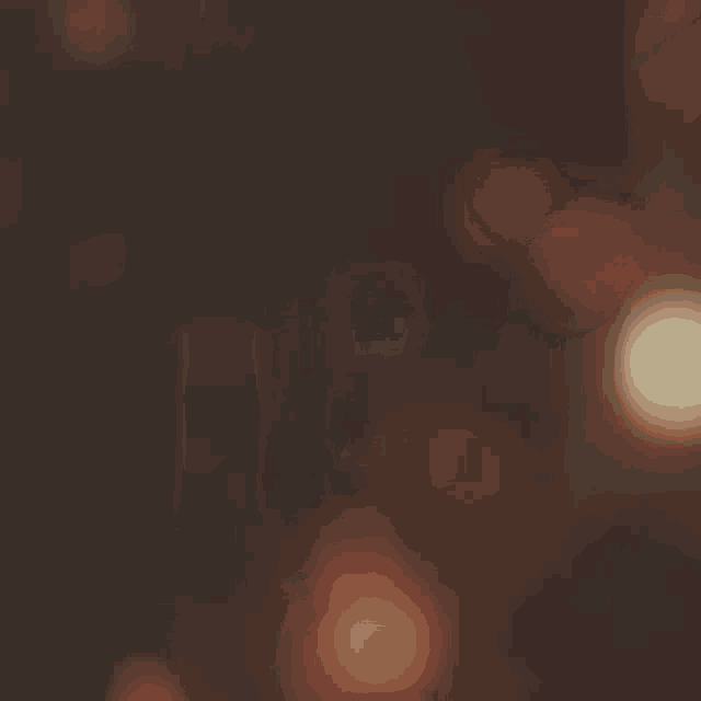 a blurry picture of a christmas tree with a lot of lights .