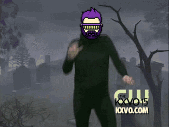 a man in a purple mask is dancing in a cemetery in front of a cnn logo