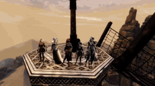 a group of people standing in a circle around a statue