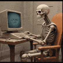 a skeleton is sitting in front of a computer that is loading life