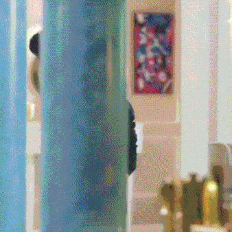 a blurry picture of a painting on a wall