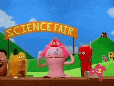 a science fair sign is above a pink monster
