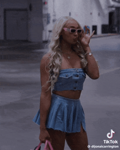 a woman wearing sunglasses and a denim outfit has a tiktok watermark on her photo
