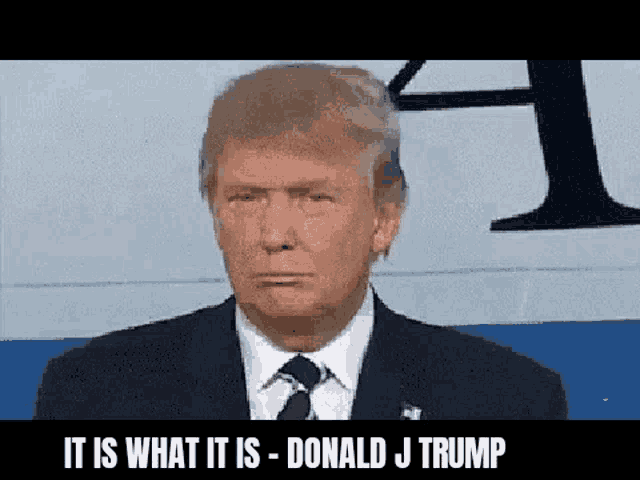 donald trump is wearing a suit and tie and making a funny face while standing in front of a plane .