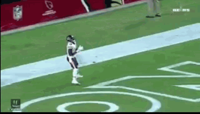 a football player is running on a field with a nfl logo in the background