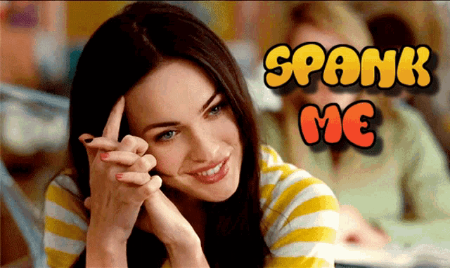 a woman is smiling with the words spank me above her