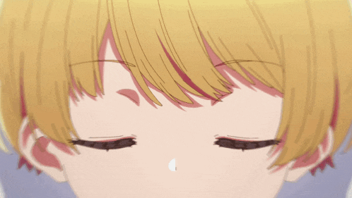 a close up of a child 's eyes with a star in the middle