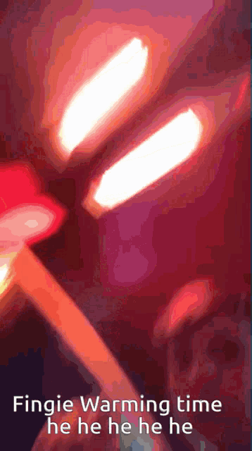 a close up of a person 's face with the words fingie warming time he he he he he