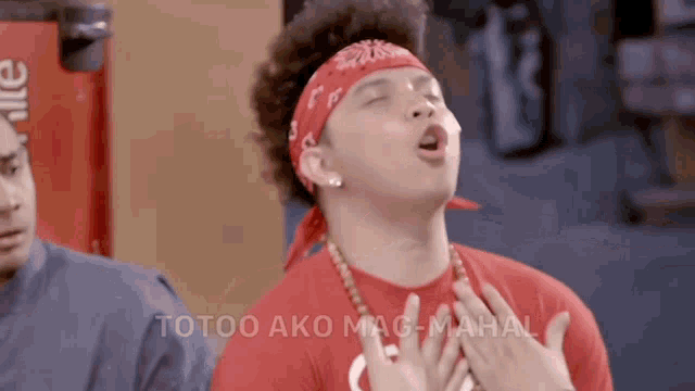 a man wearing a bandana and a red shirt says totoo ako mag-mahala