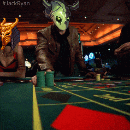 a man wearing a mask is playing poker with the hashtag #jackryan above him