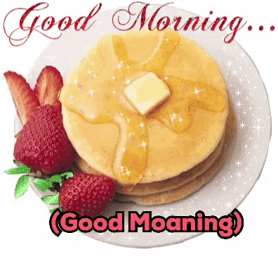 a stack of pancakes with butter and syrup and strawberries on a plate with the words good morning