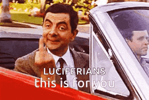 mr bean is giving the middle finger in a car .