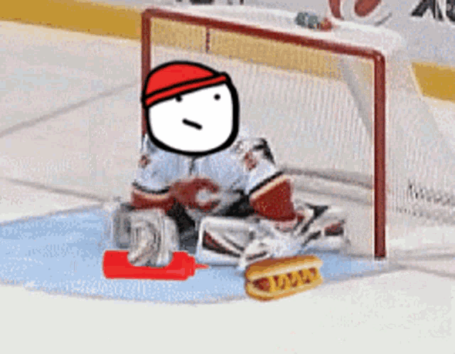 a hockey goalie is sitting on the ice with a hot dog and ketchup