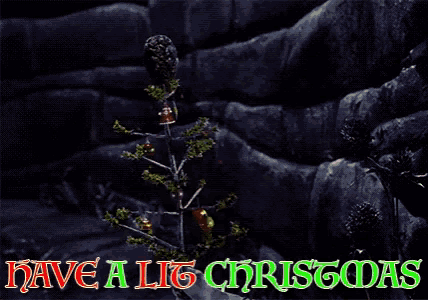 a christmas card with a fire and the words have a lig christmas