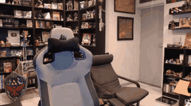 a room with a chair and a shield that says zelda