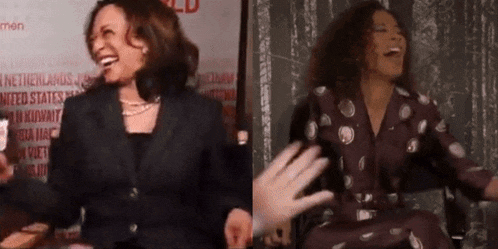 a woman in a polka dot dress is laughing next to another woman