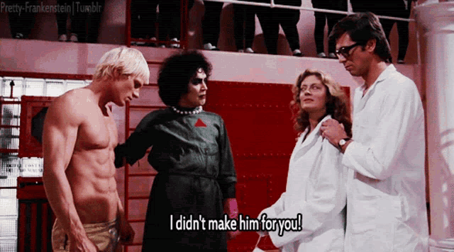 a group of people standing next to each other with one saying " i didn 't make him for you "