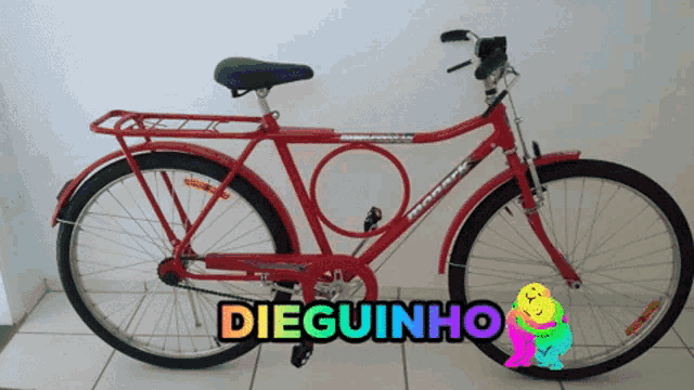 a red bicycle with the word dieguinho written on it