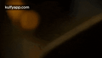 a close up of a man 's face with sweat coming out of his nose .