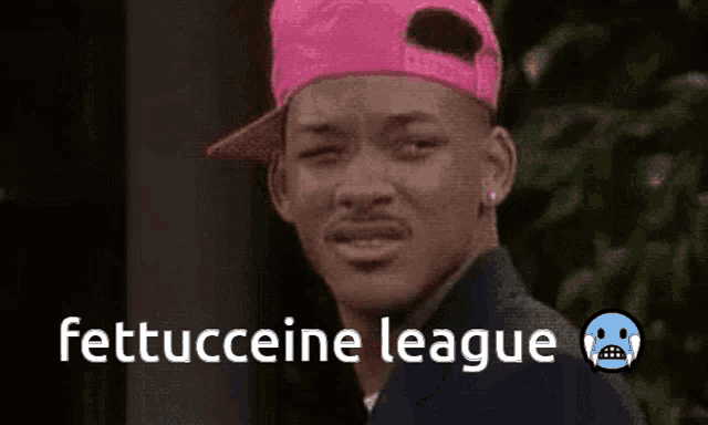 a man wearing a pink hat is crying with the words fettuccine league above him