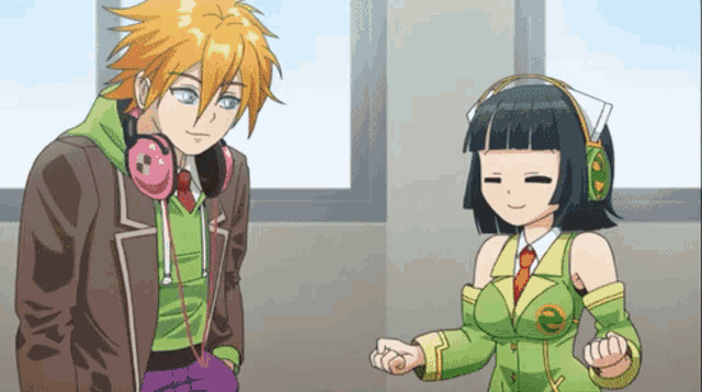 a boy and a girl standing next to each other