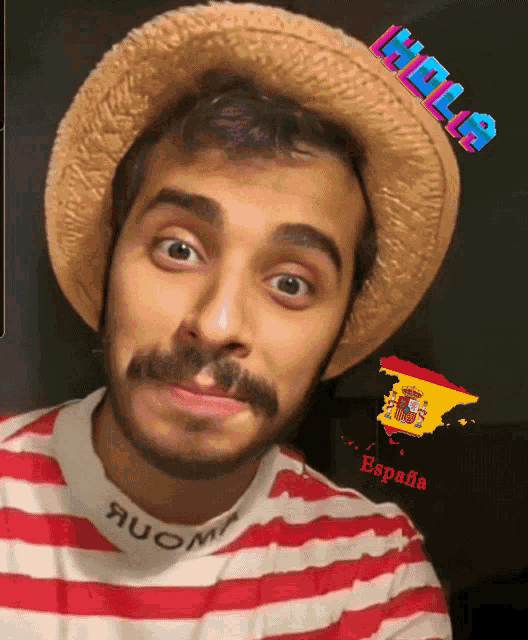 a man wearing a straw hat and a red and white striped shirt says hola