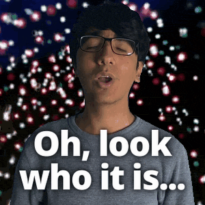 a man with glasses says oh look who it is in front of a fireworks display