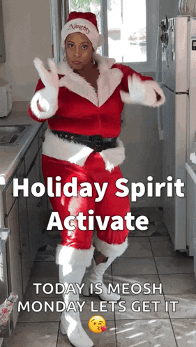 a woman in a santa suit is dancing in a kitchen with the caption holiday spirit activate today is meosh monday lets get it