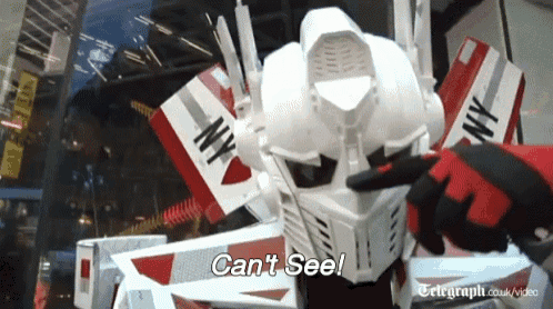 a robot with the word can 't see written on it