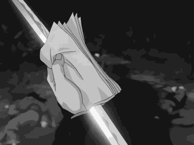 a black and white drawing of a hand holding a piece of paper