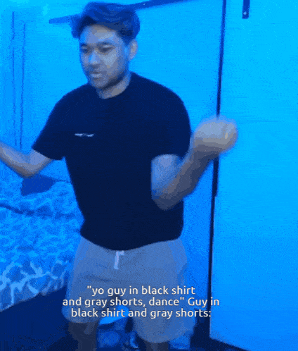 a man wearing a black shirt and gray shorts says yo guy in black shirt and gray shorts