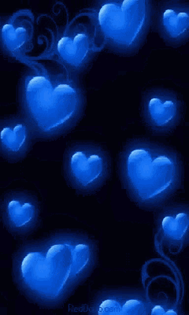 a bunch of blue hearts on a black background with the website reddo.com