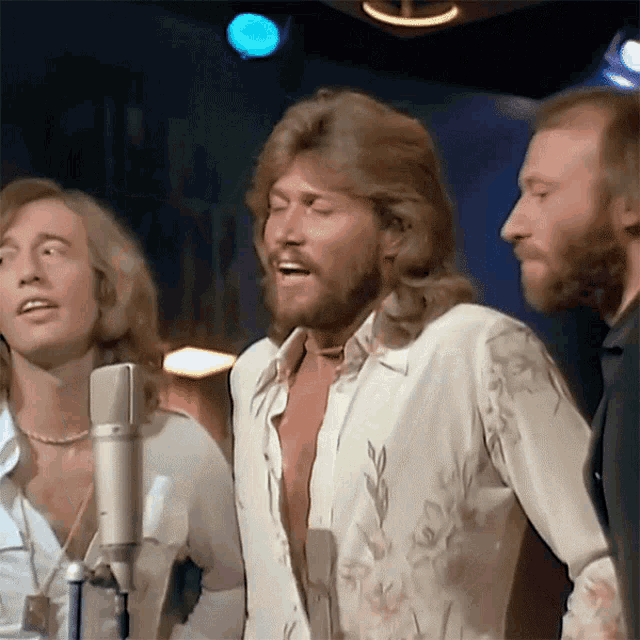 Singing Barry Gibb GIF - Singing Barry Gibb Robin Gibb GIFs