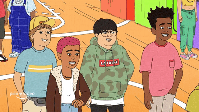 a group of people are standing in a line with one wearing a hoodie that says l.a.tribe