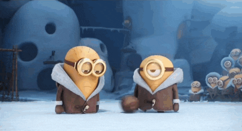 two minions wearing goggles and coats are standing next to each other in the snow
