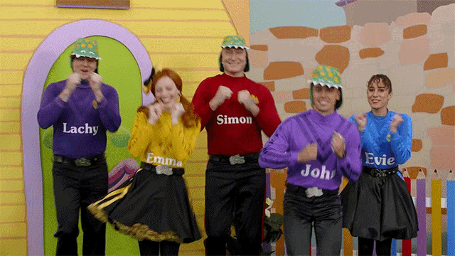 a group of people wearing shirts that say simon and emma