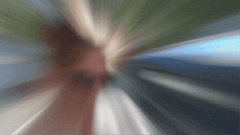 a blurry picture of a person 's face with a blurry background