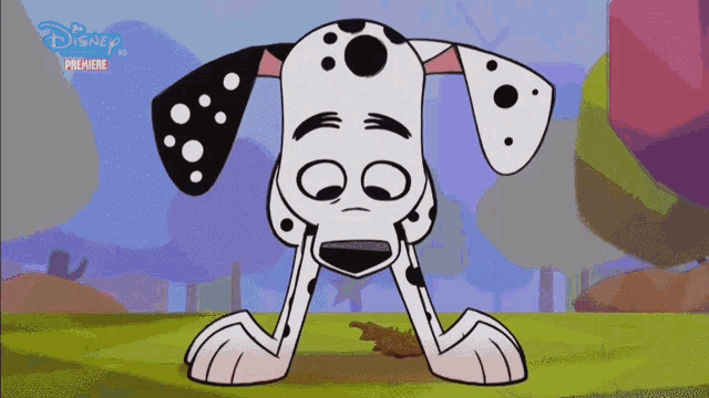 a dalmatian dog is standing in a field with a disney premiere advertisement behind it