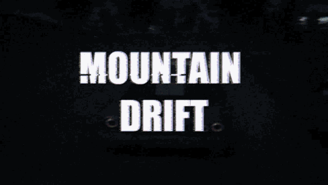 a black background with the words mountain drift on it