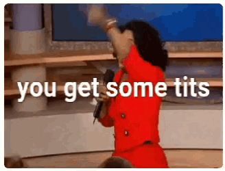 a woman in a red dress is holding a microphone and says you get some tits .