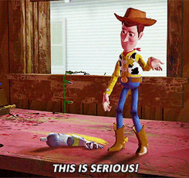 woody from toy story standing next to a broken toy